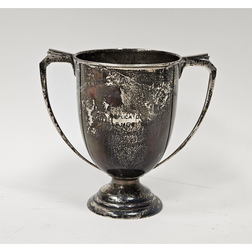 571 - Elizabeth II two-handled silver trophy cup, on circular domed foot, engraved for the London County C... 