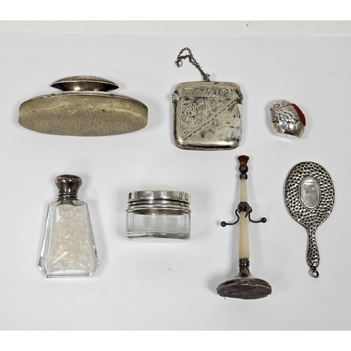 590 - A collection of silver items, including a modern silver pin cushion, in the form of a chick hatching... 