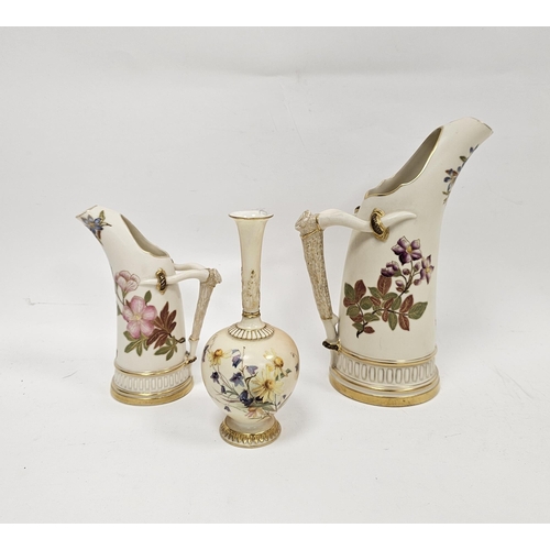 60 - A Royal Worcester blush ivory ground vase and two jugs in sizes, circa 1900, printed puce marks, the... 