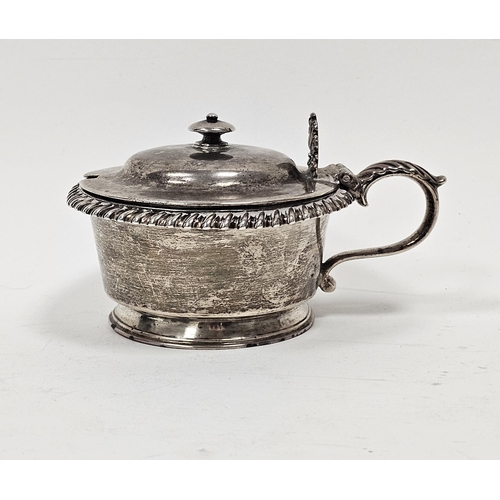 603 - A William IV circular silver mustard and cover, the hinged cover with knop finial, shell and foliate... 