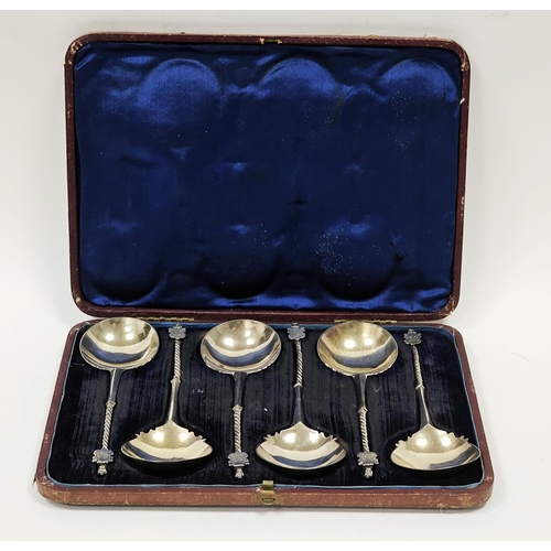 617 - A set of six Victorian silver seal-top soup spoons, the half twisted stem with griffin terminal hold... 