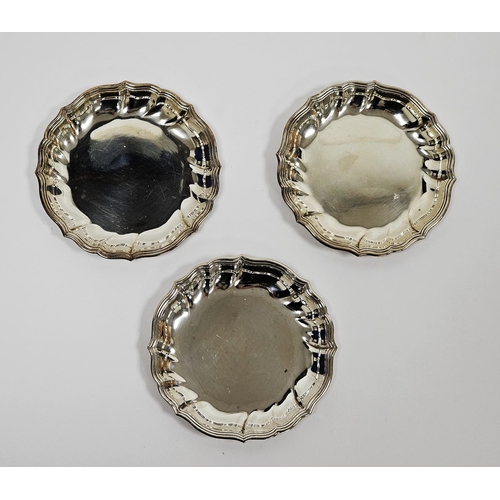 634 - Set of three Danish silver coasters circular with raised triple-reeded ogee borders, 9.5cm diameter,... 