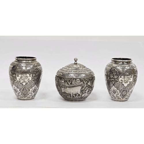 640 - Pair of Persian/Iranian white metal vases of baluster form, densley decorated with shaped cartouches... 