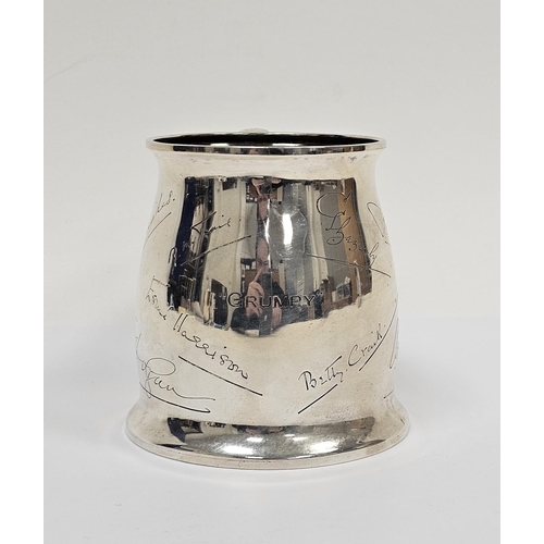 647 - Early 20th century Indian silver-coloured metal presentation mug with slight everted rim, scroll han... 