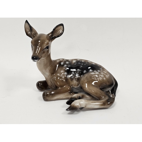 68 - Rosenthal porcelain model of a recumbent fawn, printed gilt marks, moulded F Heiderei to edge, 10cm ... 