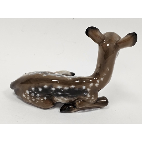 68 - Rosenthal porcelain model of a recumbent fawn, printed gilt marks, moulded F Heiderei to edge, 10cm ... 