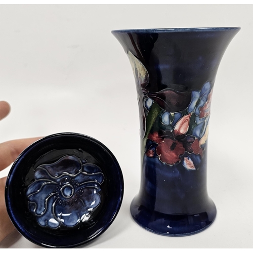 69 - Moorcroft blue-ground Iris pattern flared cylindrical vase and a small blue trinket dish, printed an... 