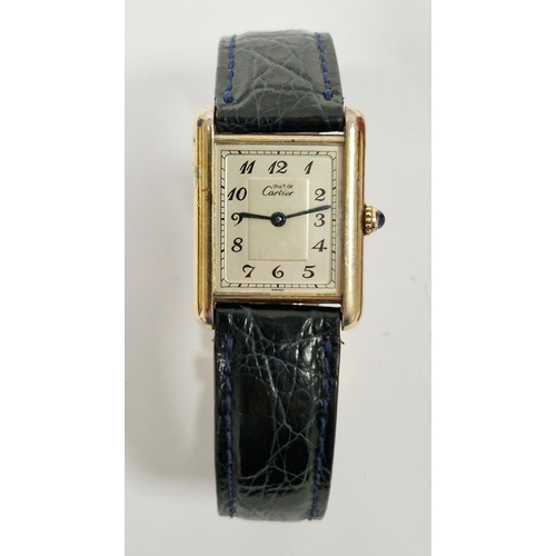 690 - Lady's Must de Cartier Vermeil Tank quartz wristwatch, the rectangular dial with Arabic numerals den... 