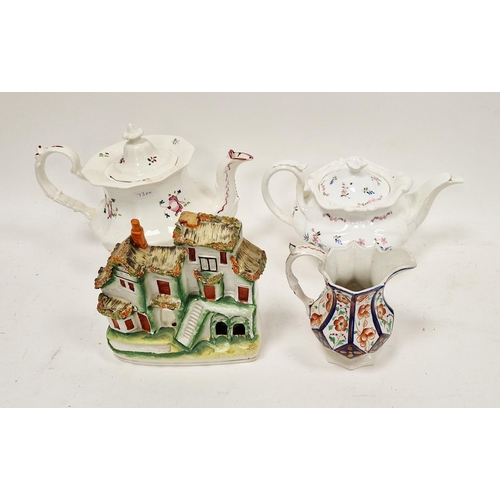 73 - Group of 19th century Staffordshire pottery and porcelain, including a model of a tiered cottage app... 