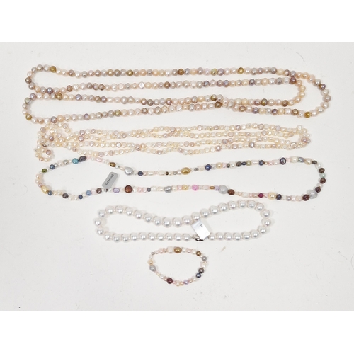 743 - Two long strings of pink, cream and other coloured cultured pearls, a string of coloured cultured pe... 