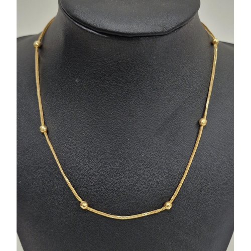 753 - 18ct gold herringbone and ball-pattern chain necklace, 5g