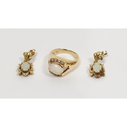 776 - 9ct gold, opal and diamond dress ring set oval opal flanked by eight diamonds and pair 9ct gold, opa... 