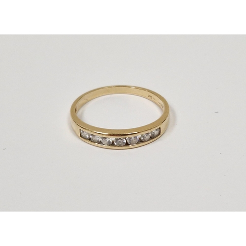 786 - 9ct gold and white stone half eternity ring, the stones channel set