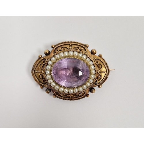 787 - Victorian gold-coloured metal, pink stone and pearl brooch, the oval pink cut stone with pearl borde... 