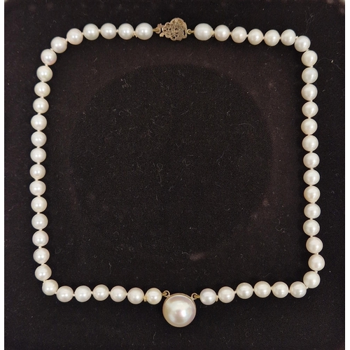 791 - String of cultured pearls with central large mounted blister pearl, on 9ct gold clasp, cased