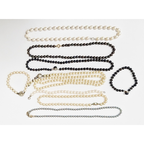 796 - Three strings of grey/black pearls, similar bracelet, white cultured pearl necklace, two strings of ... 