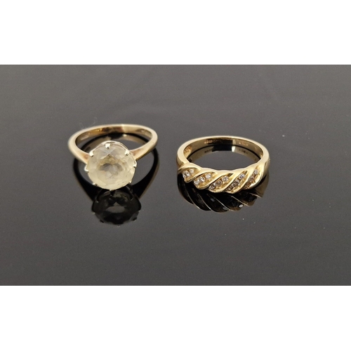 804 - 9ct gold and citrine-coloured stone dress ring with circular stone and a gold-coloured ring set smal... 