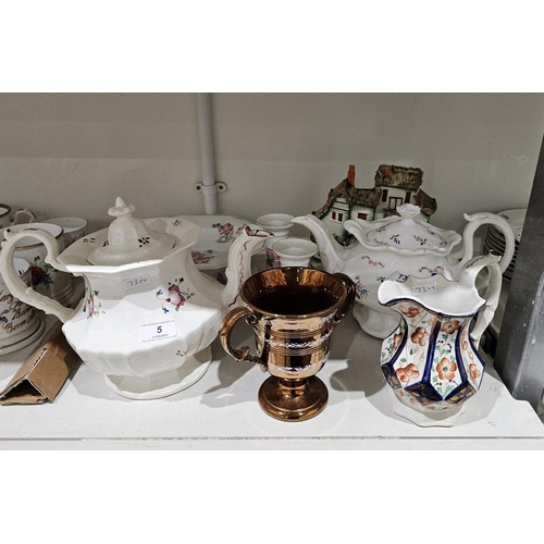 5 - Group of 19th century Staffordshire pottery and porcelain, including a model of a tiered cottage app... 