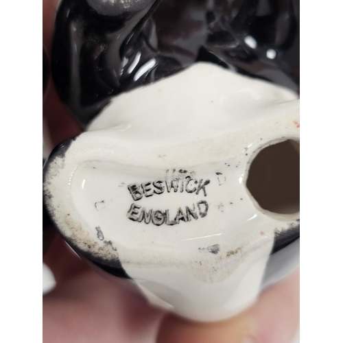 56 - Collection of Beswick pottery models of animals including a pair of pandas, one with Beswick label, ... 