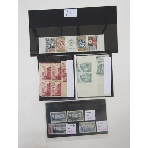 114 - World stamps: Box of ex-dealer stock remainders on stock-cards, much mint including unmounted, plus ... 