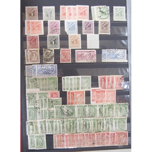 153 - Stamps of Greece: Box of 100s of definitives, commemoratives and other issues in 2 large stock-books... 