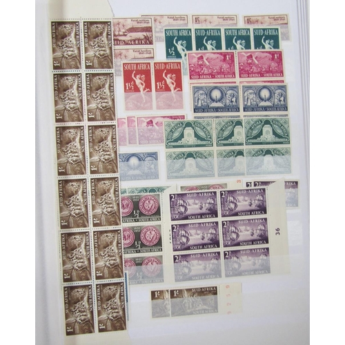 154 - South Africa stamps: Four stock-books of mainly mint/used definitives, commemoratives and postage du... 