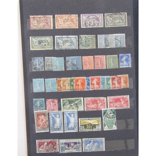 173 - Stamps of France: Red stockbook of mint and used definitives, commemoratives, Red Cross, exposition ... 