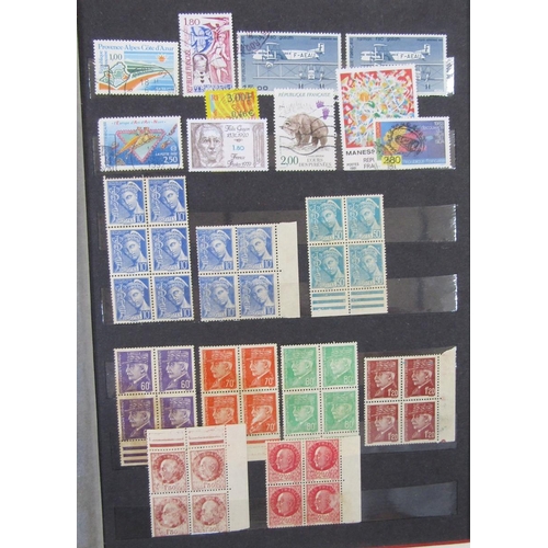 173 - Stamps of France: Red stockbook of mint and used definitives, commemoratives, Red Cross, exposition ... 