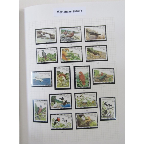 180 - Christmas Island stamps: Large, red “ Senator” album of mint and used definitives, commemoratives fr... 