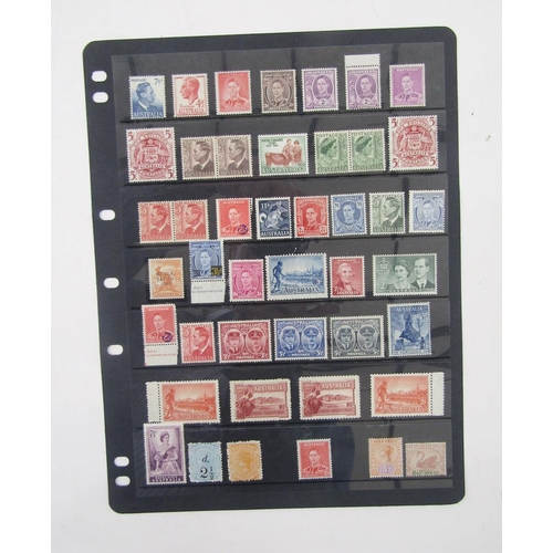 193 - Australian stamps: Five stock-sheets of mint issues, a few QV states, some unmounted. Definitives, c... 