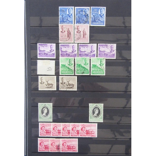 196 - Mauritius stamps: Blue A4 8 page (double-sided) stock-book of QV-QEII definitives, commemoratives an... 