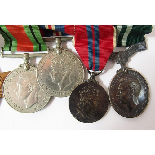 221 - WWII full size and miniature medal group, comprising 1939-45 Star, France and Germany Star, War Meda... 