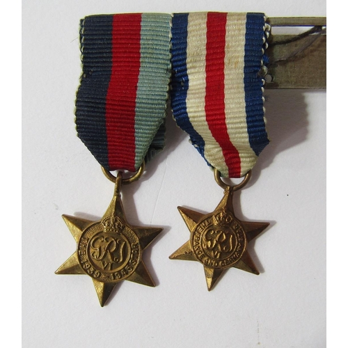 221 - WWII full size and miniature medal group, comprising 1939-45 Star, France and Germany Star, War Meda... 