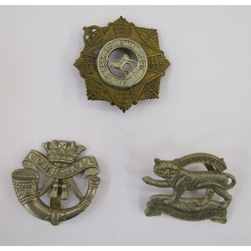 228 - Collection of British Army cap badges.