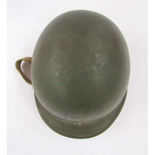 237 - American WWII pattern steel M1 helmet and liner.