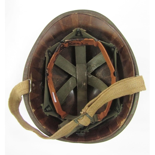 237 - American WWII pattern steel M1 helmet and liner.