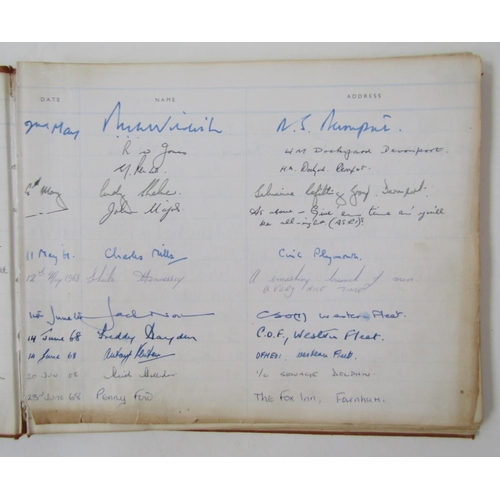 242 - Leather covered visitor's book for the frigate HMS Lincoln, together with a framed crest.