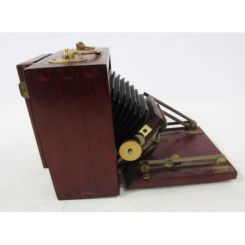 263 - Early 20th Unicum bellow field camera, mahogany and brass bound case, marked Bausch and Lomb co