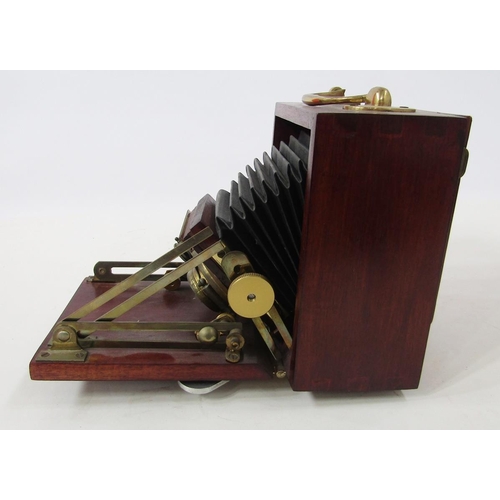 263 - Early 20th Unicum bellow field camera, mahogany and brass bound case, marked Bausch and Lomb co