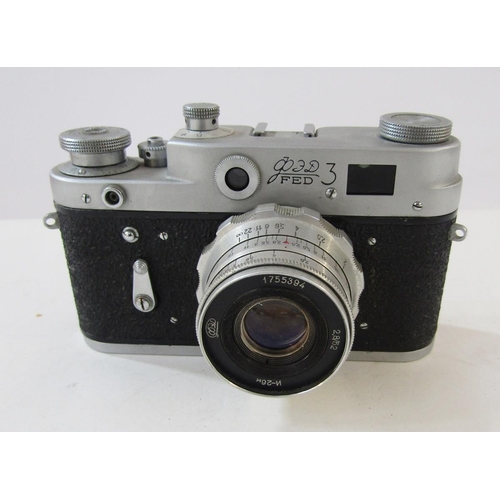 280 - Three USSR cameras, comprising Zorki 4K, no 75895905, with Jupiter 8 2/50 lens, Kiev with 2/53 lens ... 