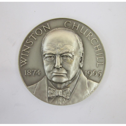 322 - Winston Churchill silver medal by John Pinches (medallists) with 4d stamp.