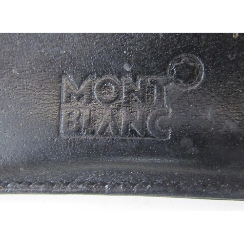 361 - Two leather Montblanc wallets, both marked to interior Montblanc Hamburg, the largest approximately ... 