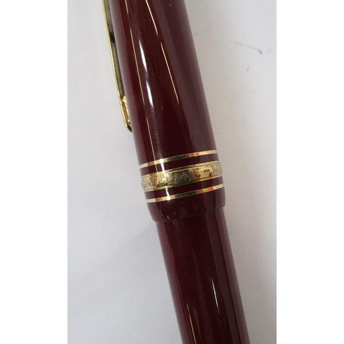 364 - Montblanc Meisterstuck ball point pen no 161, ox blood red with gold band decoration, serial number ... 