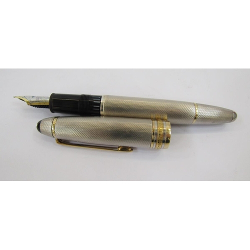 365 - Montblanc Meisterstuck silver fountain pen no 146, with engine turned silver case with gold band dec... 