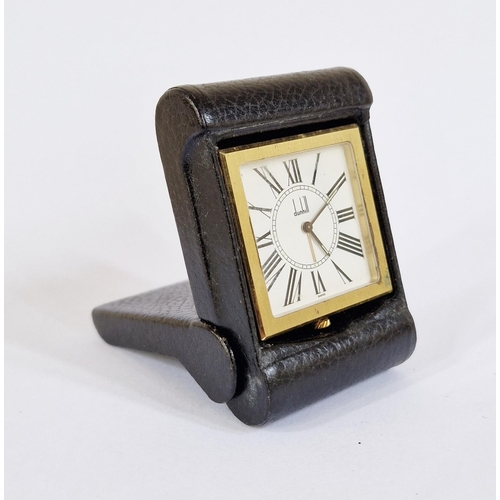 388 - Dunhill gilt metal and leather covered folding travel clock, rectangular, the square face with Roman... 