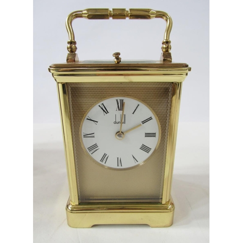 392 - Dunhill brass repeater carriage clock having engine-turned face surrounding a white enamel dial, pla... 