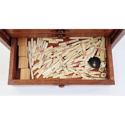 400 - Bone and wood mahjong set with instruction booklet, in stained wood five-drawer table top cabinet wi... 