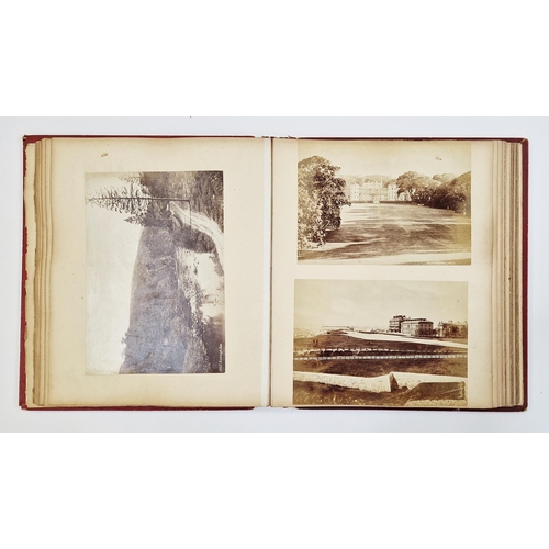 402 - Photograph album containing late 19th/early 20th century, containing views of Looe, Cornwall, Glouce... 