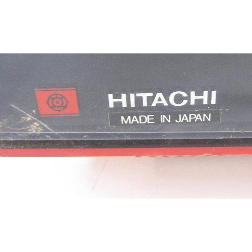 413 - Hitachi transistor TV receiver, model P-32-311, no.GSC027291 in red case, circa 1970's, 40cm wide x ... 