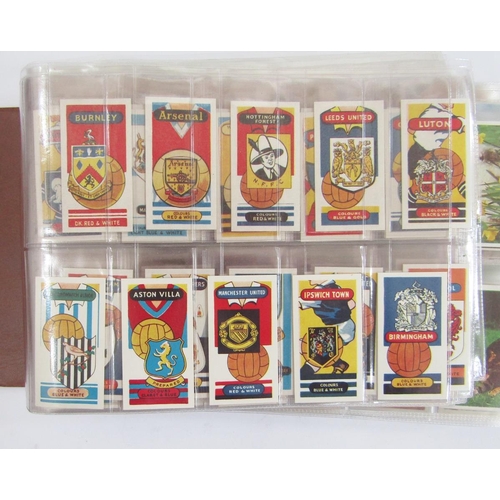 428 - Cigarette and tea cards in four albums to include Brooke Bond Tea, John Player & Sons Characters fro... 